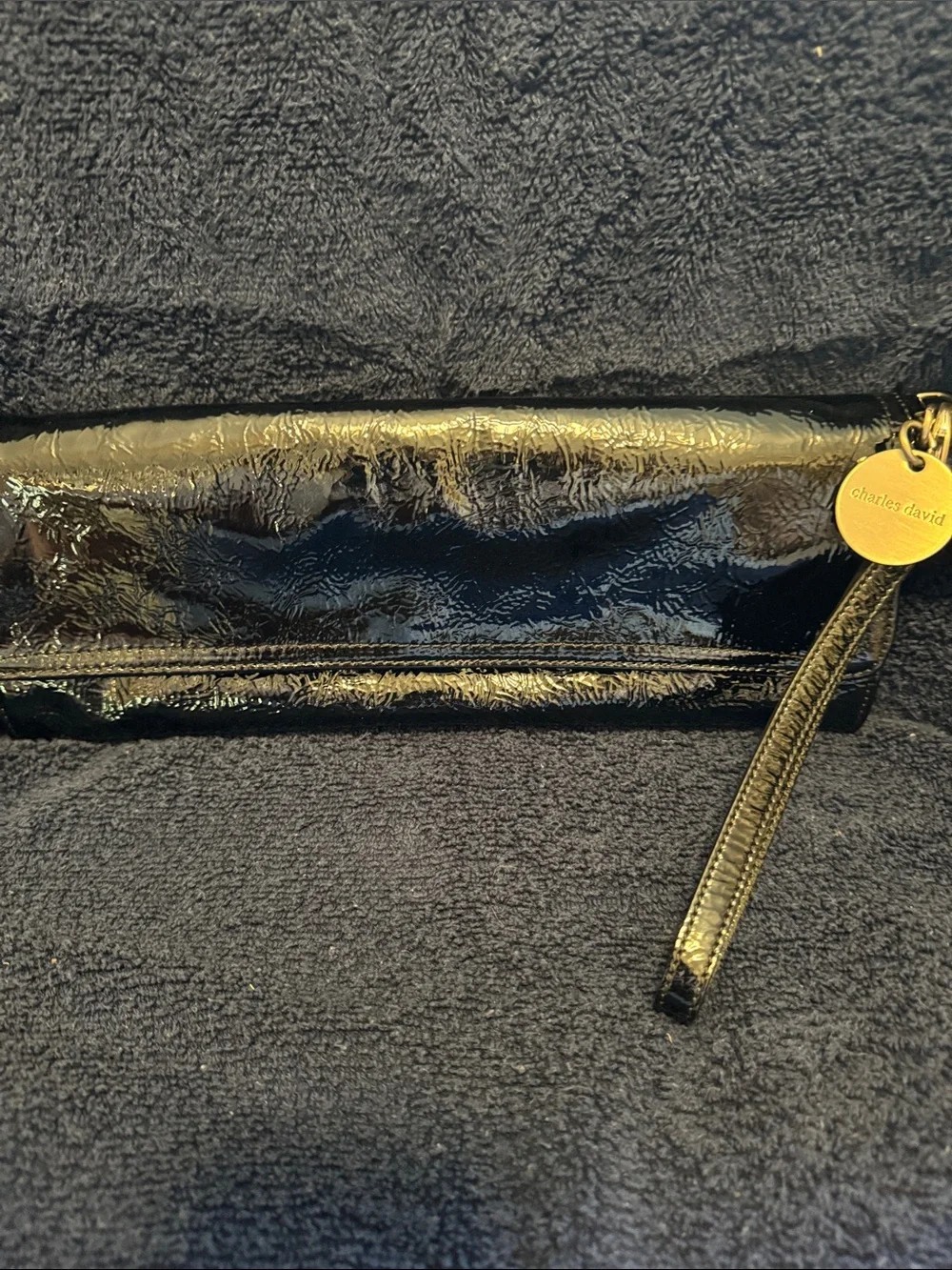 Charles David Black Patent Leather Wristlet with Gold Charm